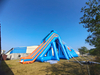 Crazy loudspeaker trampoline park large Inflatable Floating Pool water rotate Slide