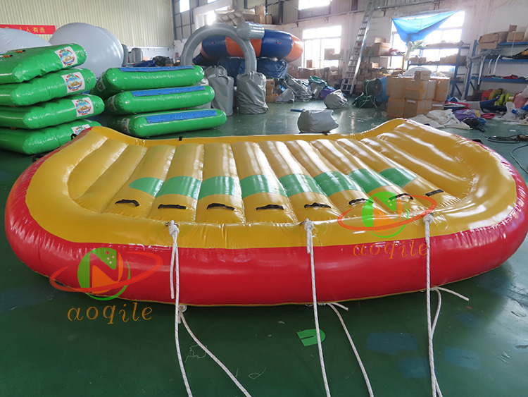 Outdoor sports game aqua games water floating spinner spinning rotating roll saturn towable tube disco boat for sale