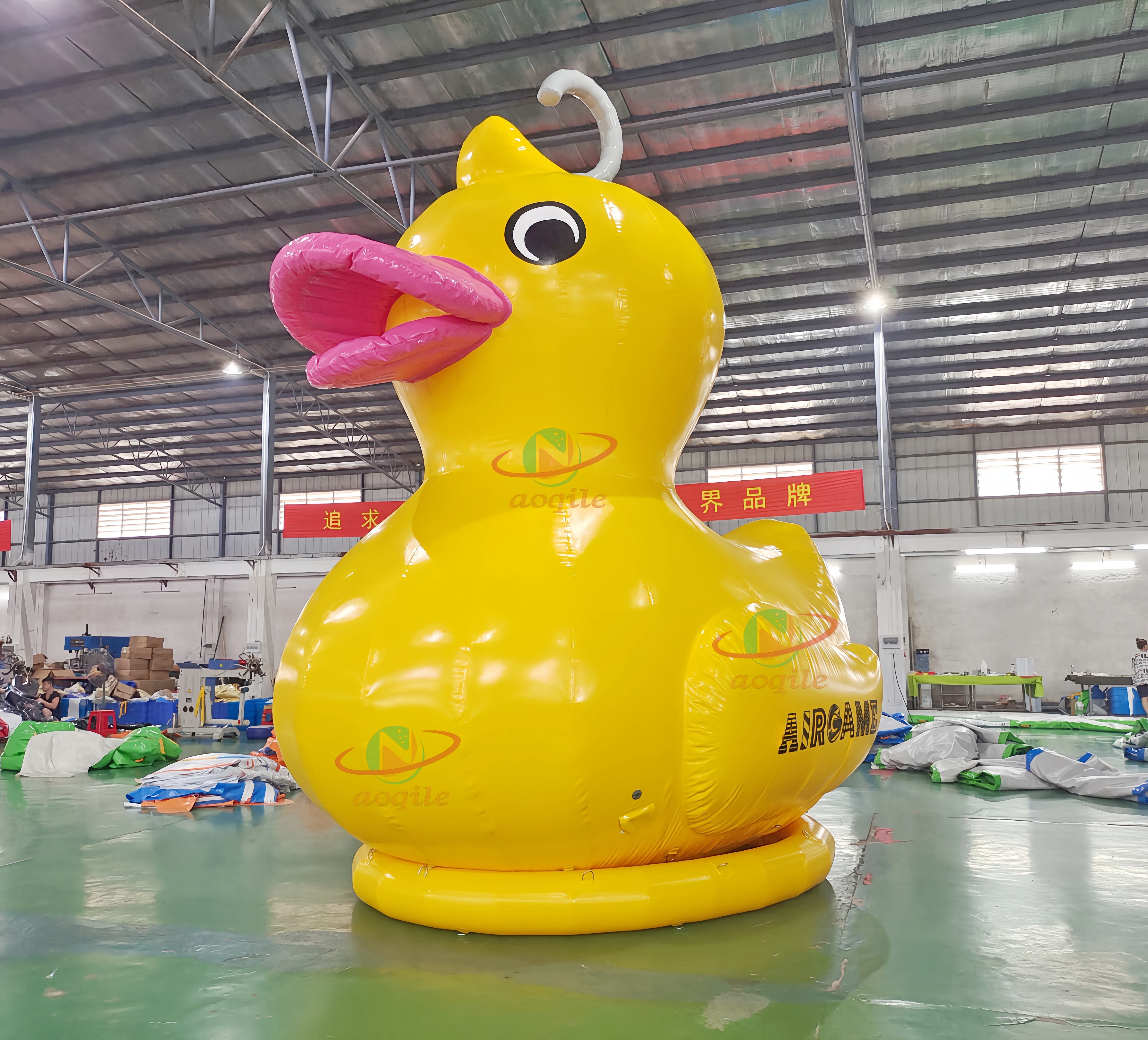 Advertising yellow giant inflatable duck inflatable rubber duck in the lake or land for propaganda