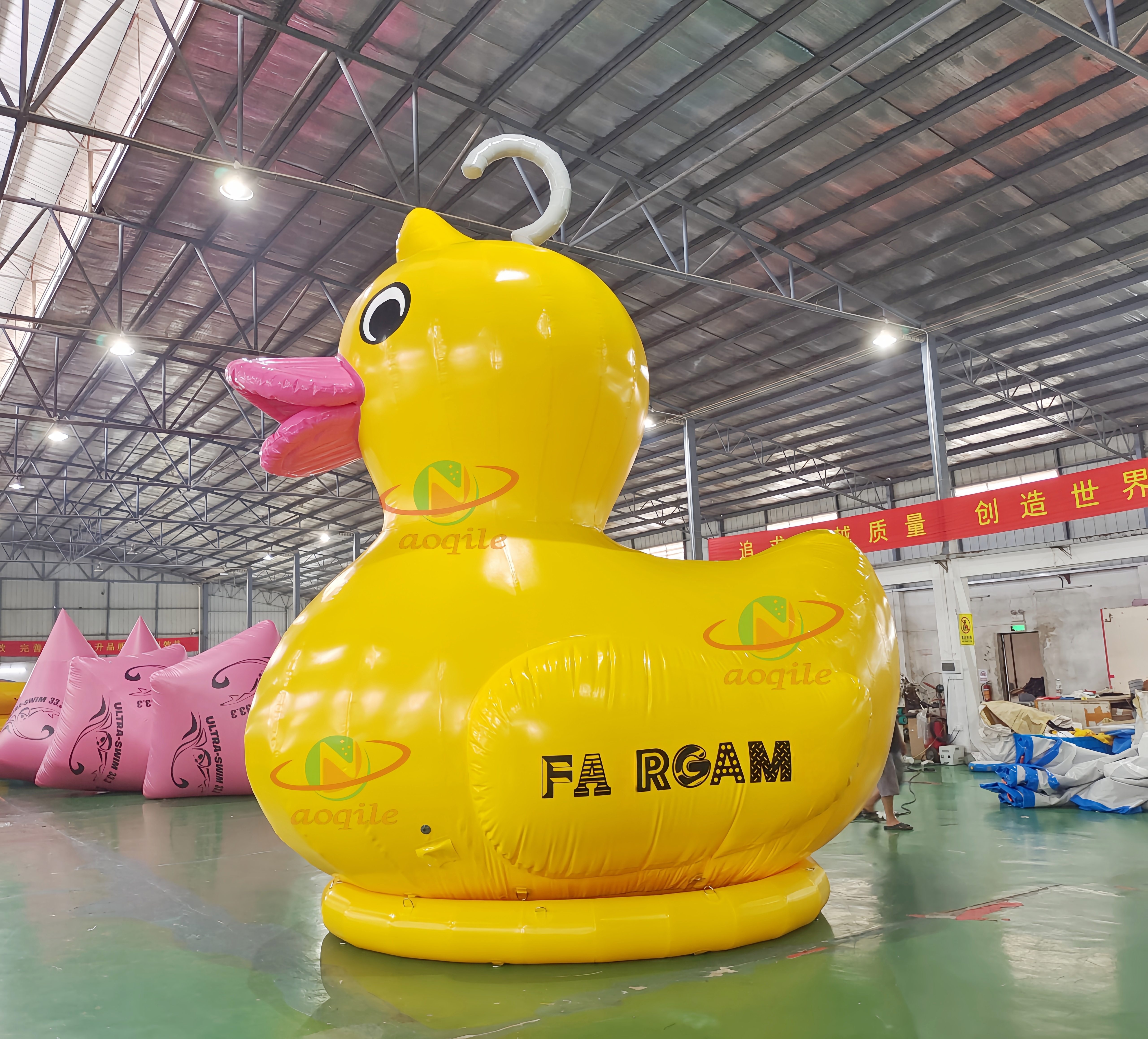 Advertising yellow giant inflatable duck inflatable rubber duck in the lake or land for propaganda