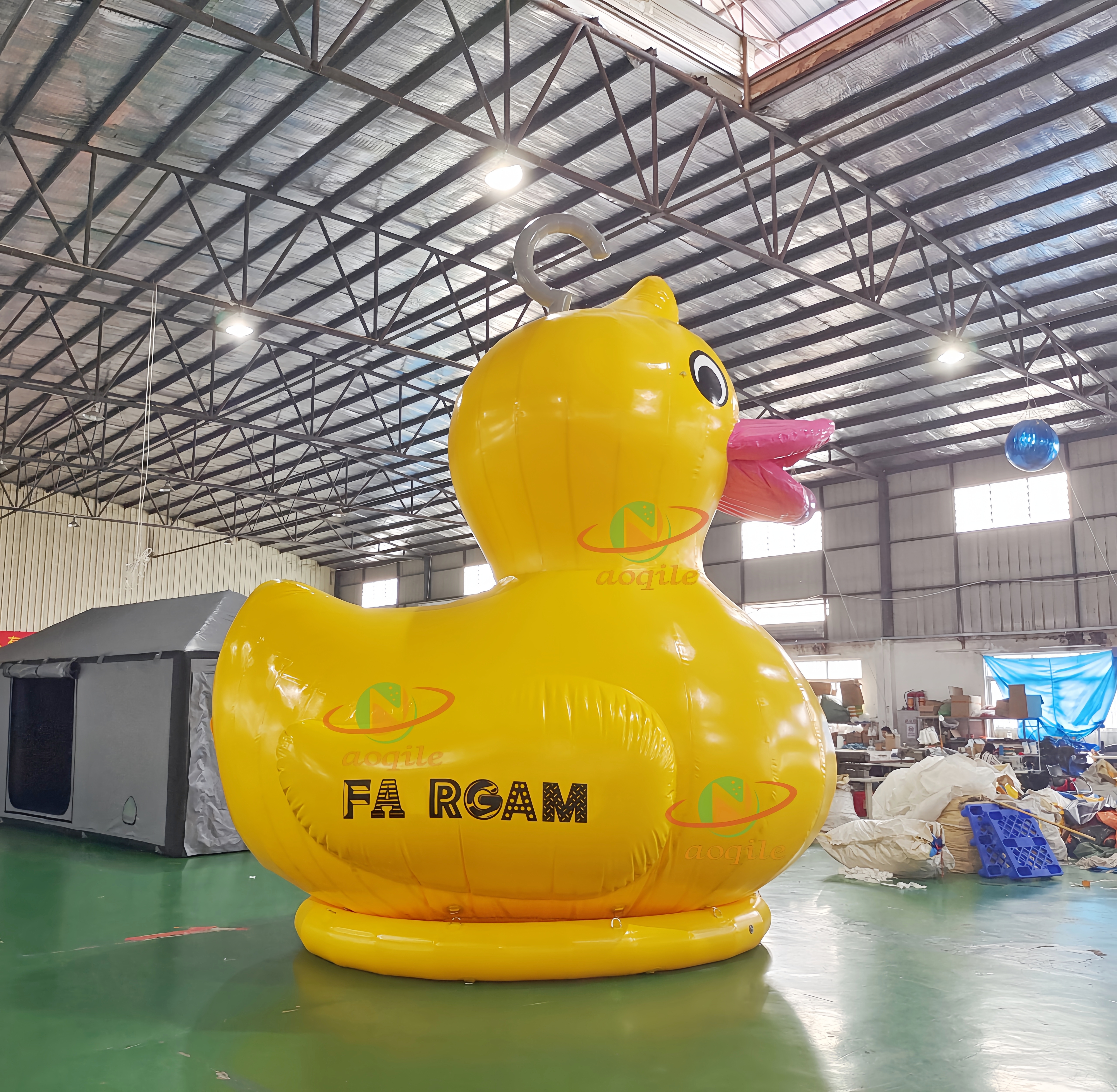 Advertising yellow giant inflatable duck inflatable rubber duck in the lake or land for propaganda