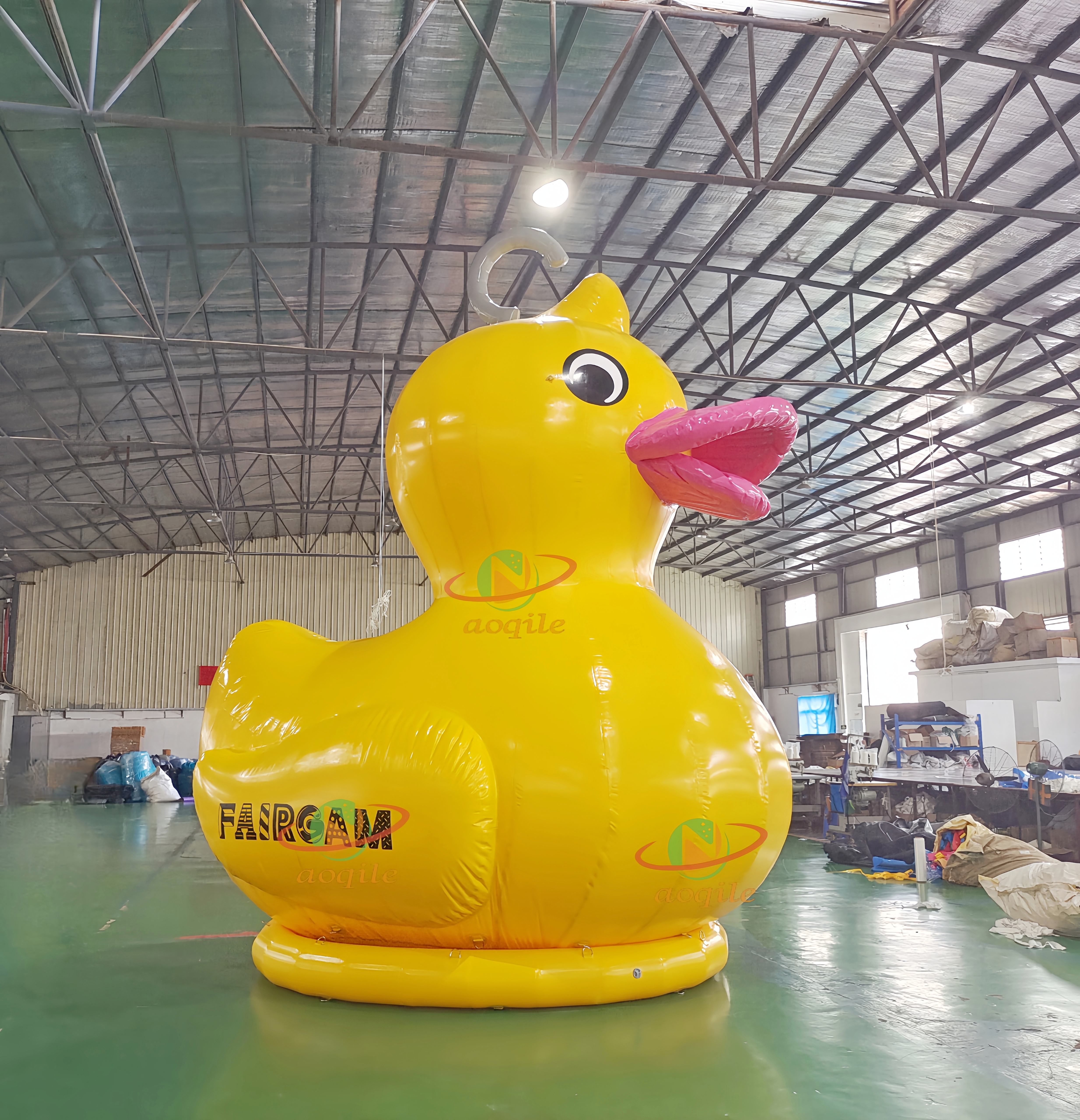 Advertising yellow giant inflatable duck inflatable rubber duck in the lake or land for propaganda